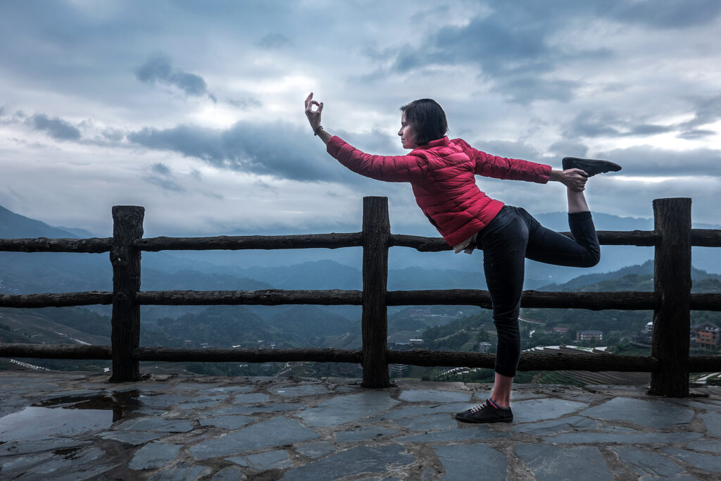 Shawn balancing in Dancer pose in Guangxi, China